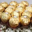 Elegant Pink Flower Arrangement with Ferrero Rocher in a Luxurious Box