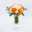 Elegant Orange and Cream Rose Arrangement in Crystal Glass Vase