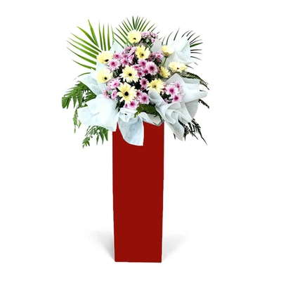 Gerberas Purple Pom In Beautiful Red Stand