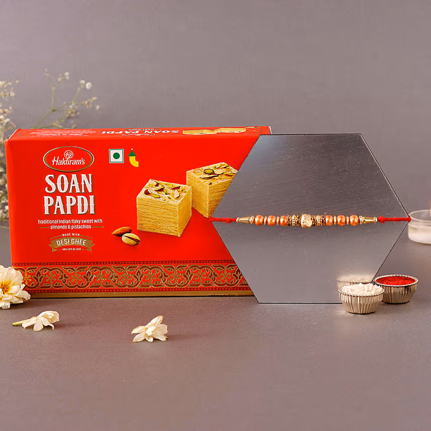 Sneh Rose Gold Rakhi & Soan Papdi