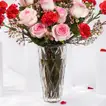 راقية | فازة 21 وردة حمراء و زهرية