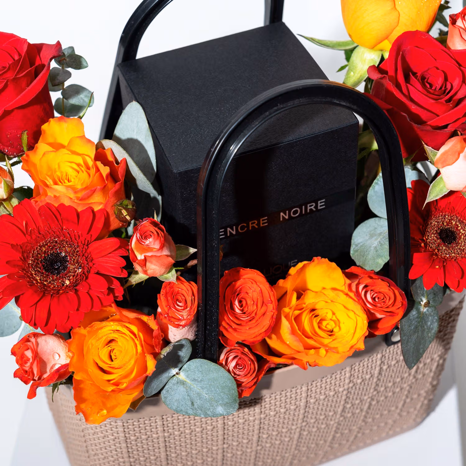 Luxurious Floral Bag Arrangement with Encre Noire Perfume