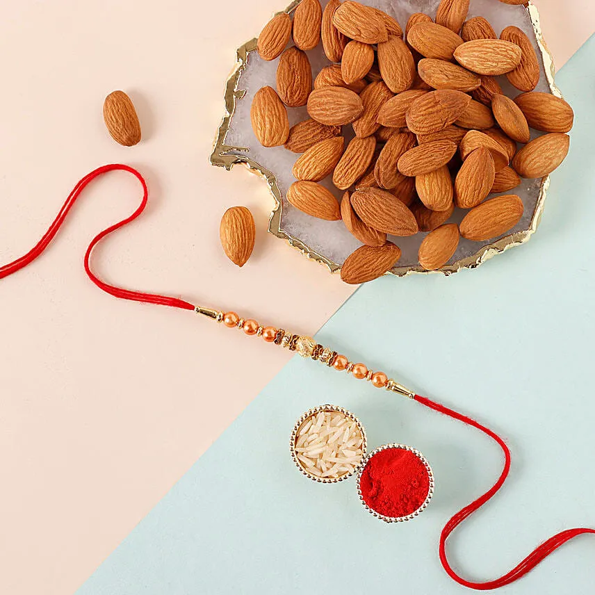 Rose Gold Pearl And Beads Rakhi with 250 Grams Almonds