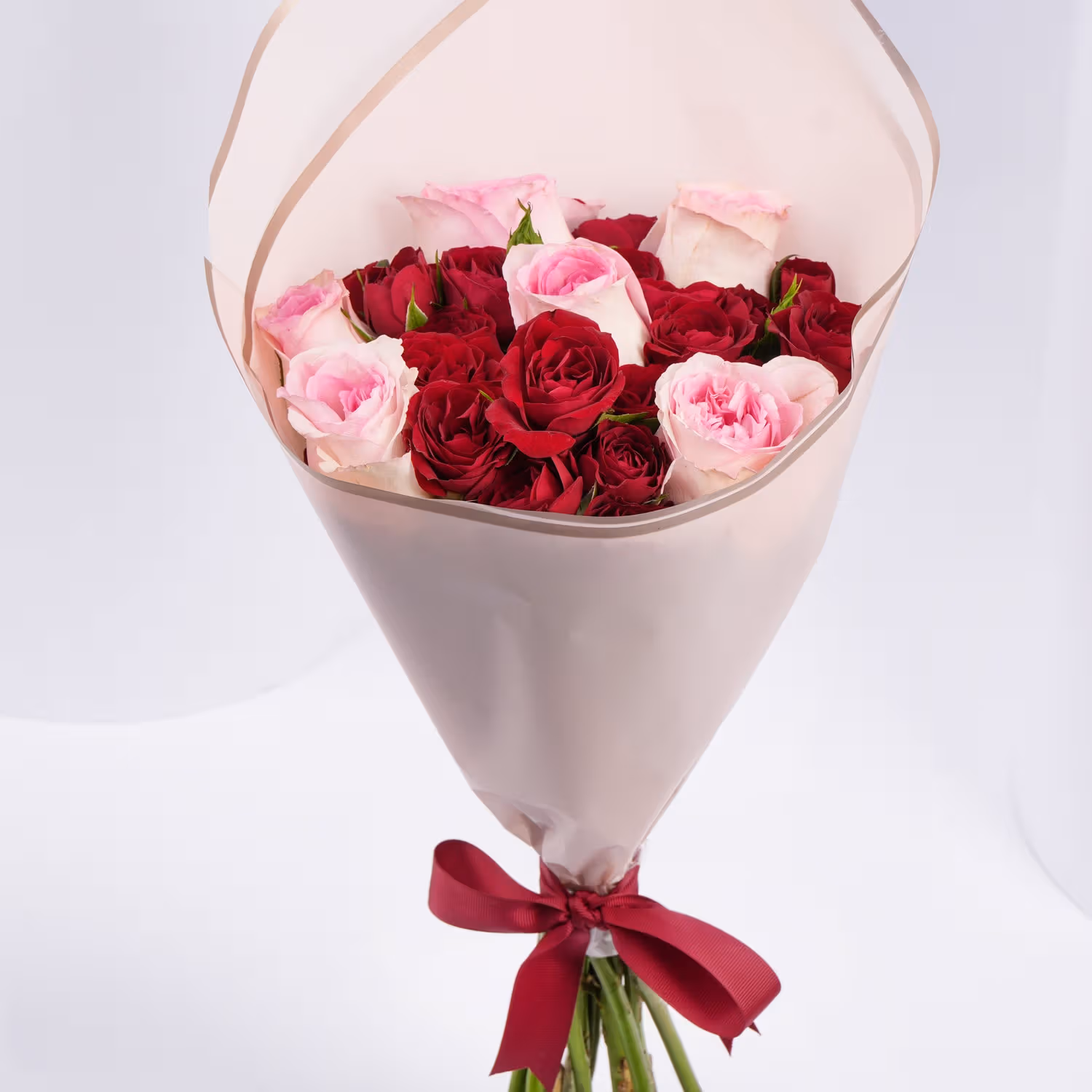 Moments in Bloom: Elegant Pink and Red Rose Bouquet - With Cake