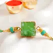 Elegant Green Agate Stone Rakhi with Lindt Extra Creamy Chocolate Gift Set