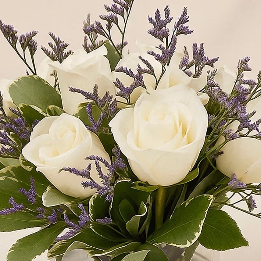 White Roses In A Vase