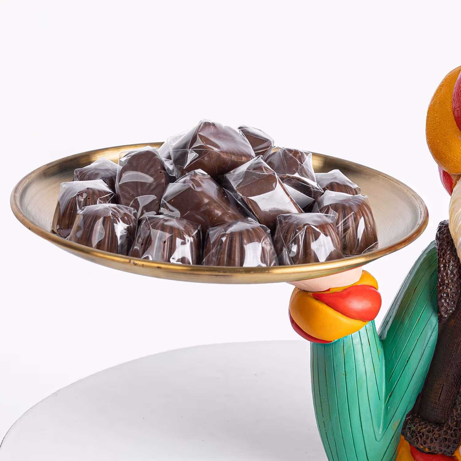 Belgian Chocolates In Fananees Sheikh Holding Plate