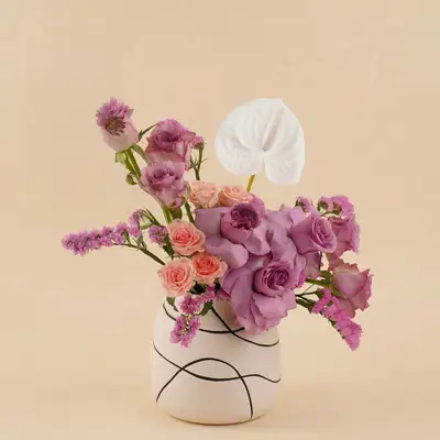 Purple Roses Vase with White Anthurium