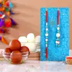 Elegant Blue Lumba Rakhi Set with Haldiram's Gulabjamun and Rasgulla - Celebrate Raksha Bandhan in Style