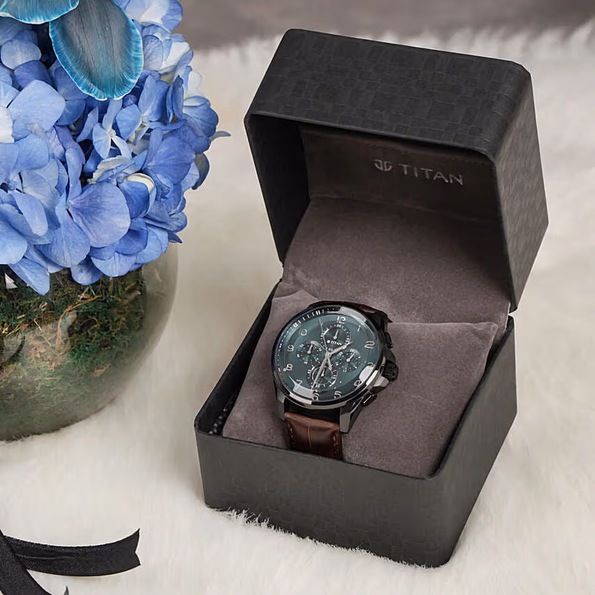 Titan Watch For Him Blue Dial With Floral Arrangement