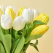 Elegant Arrangement of 20 White and Yellow Tulips in a Stylish Glass Vase