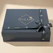 Opera Patisserie Chocolate Delight Duo Box with Elegant White Floral Arrangement