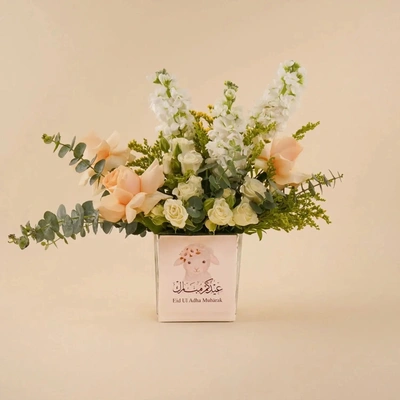 Elegant Eid Al Adha Floral Arrangement in Glass Vase